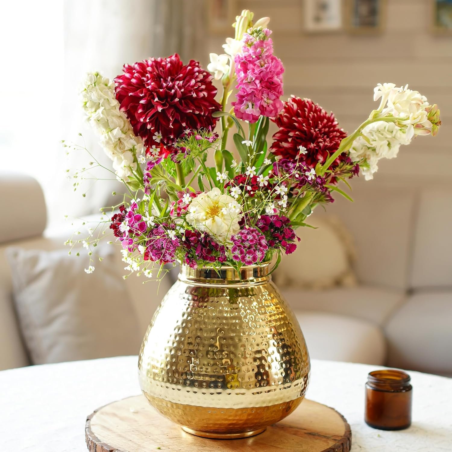 Elegant matki-shaped hammered metal vase, perfect for fresh or artificial flowers. Adds a modern yet traditional charm to your home, office, or gifting décor.